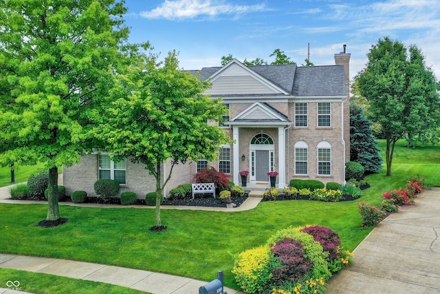 3345 Kilkenny Cir, Carmel, IN 46032 - view of front of property featuring a chimney and a front yard