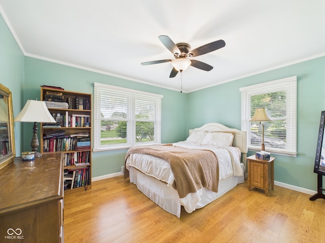 3809 N Glenwood Ave, Muncie, IN 47304 - bedroom featuring light wood-style floors, ornamental molding, and ceiling fan