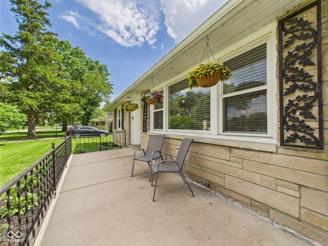 3809 N Glenwood Ave, Muncie, IN 47304 - covered porch featuring a lawn