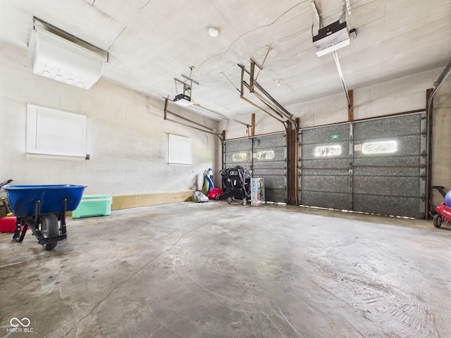 3809 N Glenwood Ave, Muncie, IN 47304 - garage featuring a garage door opener
