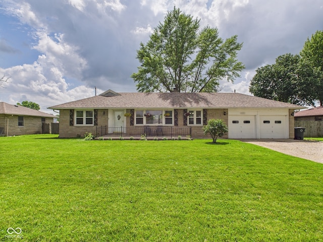 3809 N Glenwood Ave, Muncie, IN 47304 - ranch-style home with gravel driveway, an attached garage, and brick siding