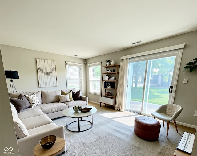 1173 Carlton Ct, Greenwood, IN 46143 - living room with baseboards and light colored carpet