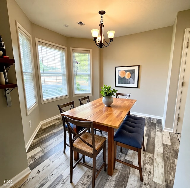 1173 Carlton Ct, Greenwood, IN 46143 - dining room with a chandelier and wood finished floors