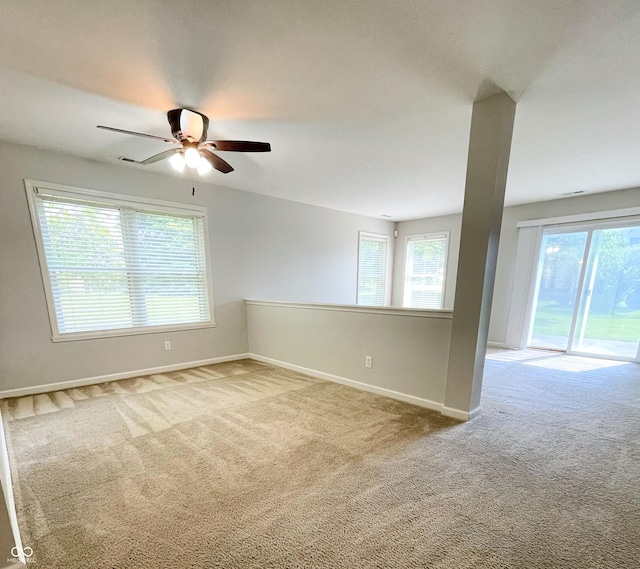 1173 Carlton Ct, Greenwood, IN 46143 - unfurnished room featuring carpet, plenty of natural light, and ceiling fan