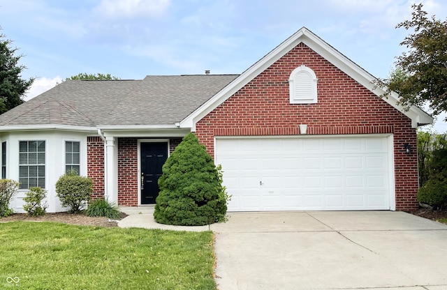 1173 Carlton Ct, Greenwood, IN 46143 - view of front of home with brick siding, a shingled roof, concrete driveway, and an attached garage