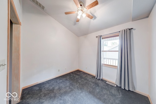 8635 S Providence Dr, Nineveh, IN 46164 - empty room with lofted ceiling, ceiling fan, and dark carpet