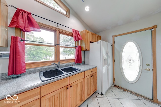 8635 S Providence Dr, Nineveh, IN 46164 - kitchen with lofted ceiling, light tile patterned floors, and white refrigerator with ice dispenser