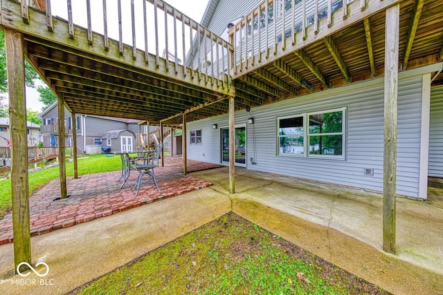 8635 S Providence Dr, Nineveh, IN 46164 - view of patio featuring a storage unit and a wooden deck