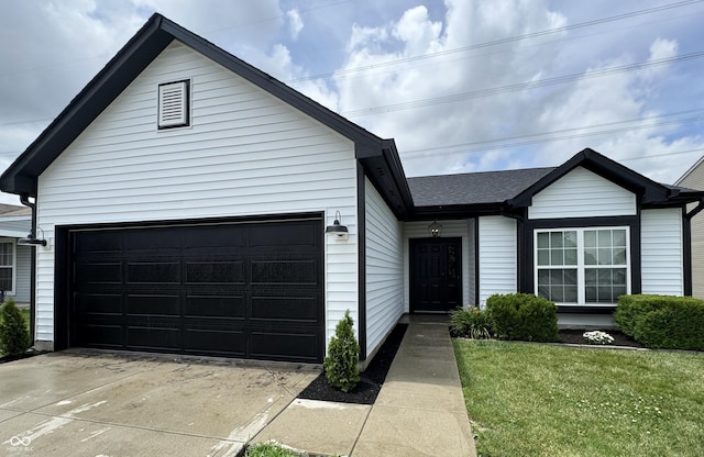 4726 Deacon Ln, Indianapolis, IN 46237 - single story home with concrete driveway, a front yard, and an attached garage