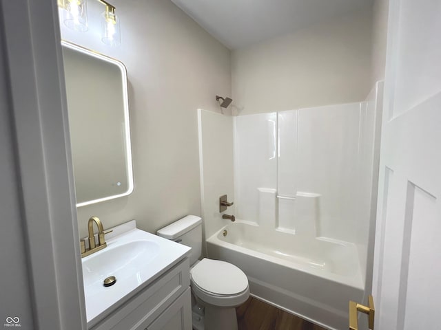 4726 Deacon Ln, Indianapolis, IN 46237 - bathroom featuring tub / shower combination, vanity, and wood finished floors