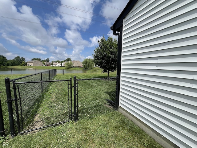 4726 Deacon Ln, Indianapolis, IN 46237 - view of yard featuring a gate and a water view