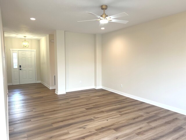 4726 Deacon Ln, Indianapolis, IN 46237 - unfurnished room with wood finished floors, recessed lighting, and a ceiling fan