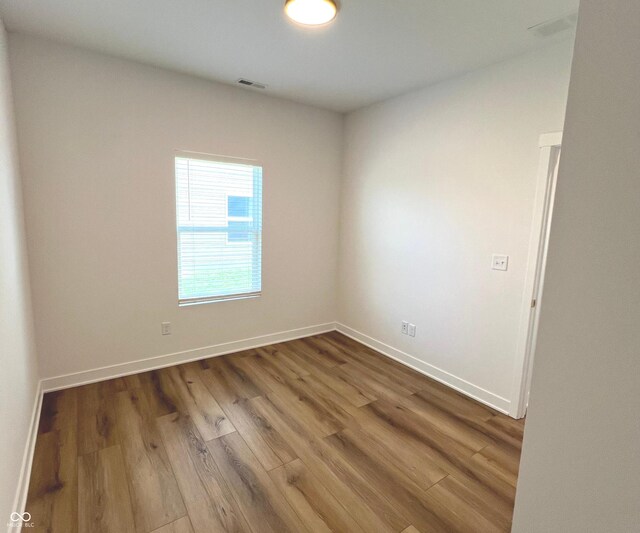 4726 Deacon Ln, Indianapolis, IN 46237 - unfurnished room featuring wood finished floors and baseboards