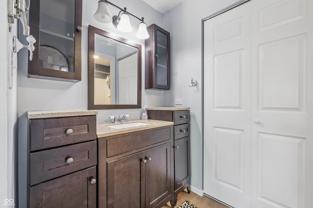 8158 Shorewalk Dr Unit F, Indianapolis, IN 46236 - bathroom featuring vanity and wood finished floors