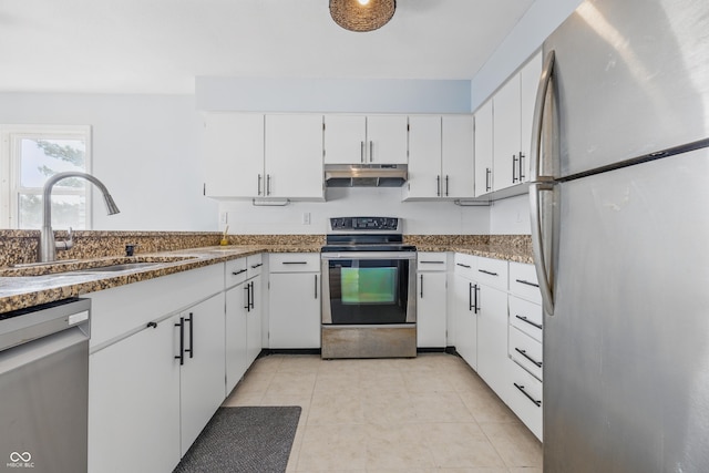 8158 Shorewalk Dr Unit F, Indianapolis, IN 46236 - kitchen with stainless steel appliances, under cabinet range hood, white cabinets, and light tile patterned floors