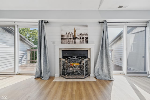 8158 Shorewalk Dr Unit F, Indianapolis, IN 46236 - detailed view of wood finished floors and a fireplace