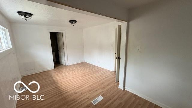 252 Ringwood Way, Anderson, IN 46013 - spare room with wood finished floors and baseboards