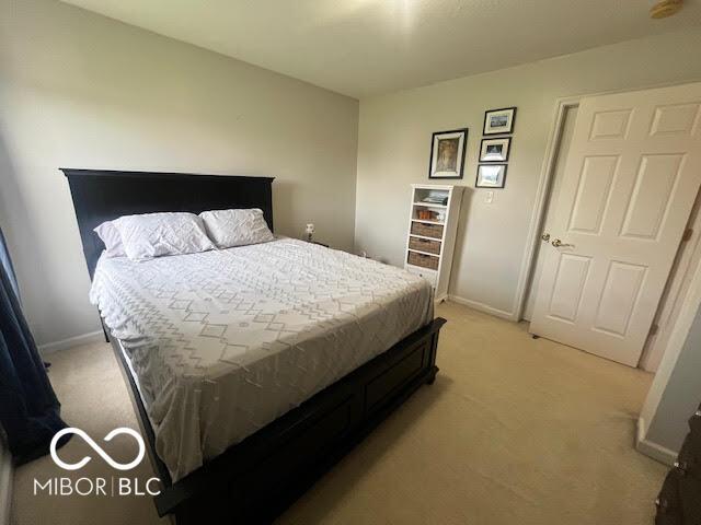 2231 Abbey St, Brownsburg, IN 46112 - bedroom featuring light carpet and baseboards