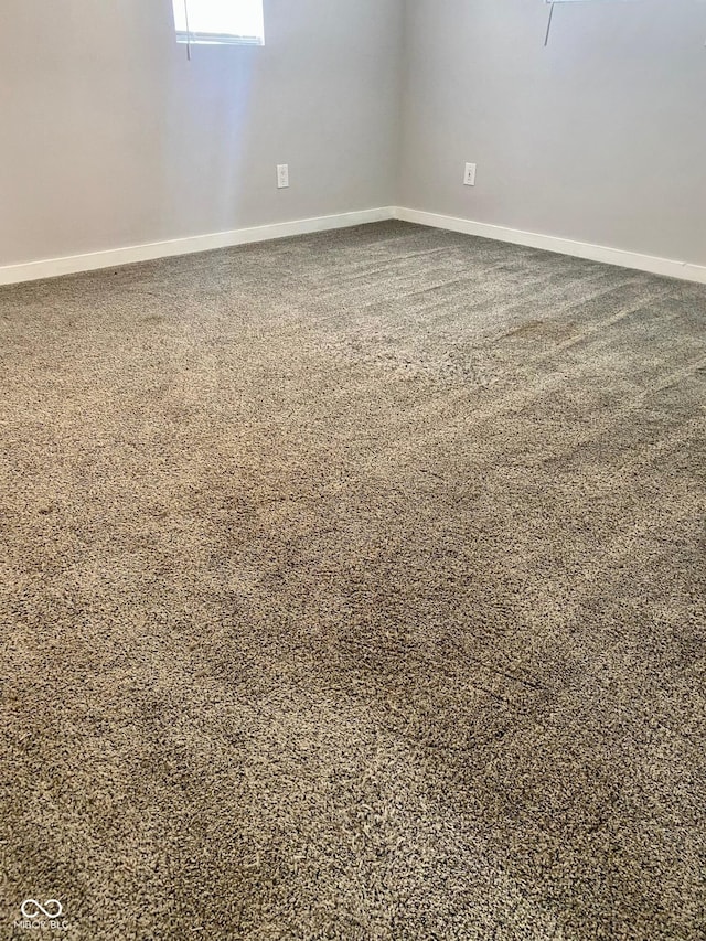 3464 N Bancroft St, Indianapolis, IN 46218 - unfurnished room featuring baseboards and carpet flooring