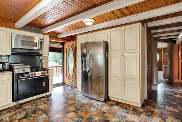 1155 Cope Rd, Martinsville, IN 46151 - kitchen with appliances with stainless steel finishes, cream cabinets, a wooden ceiling with exposed beams, stone tile flooring, and wooden walls