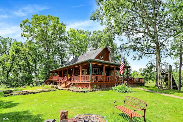 1155 Cope Rd, Martinsville, IN 46151 - rear view of property with stairs, a fire pit, a lawn, and covered porch