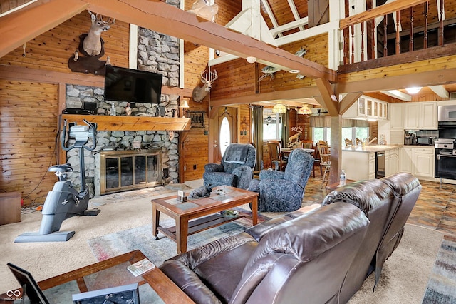 1155 Cope Rd, Martinsville, IN 46151 - living room featuring wooden walls, high vaulted ceiling, a stone fireplace, beverage cooler, and beam ceiling