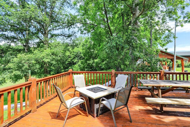 1155 Cope Rd, Martinsville, IN 46151 - wooden deck featuring a fire pit