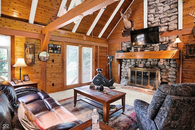1155 Cope Rd, Martinsville, IN 46151 - carpeted living room with wood walls, a wood ceiling with exposed beams, a fireplace, and high vaulted ceiling