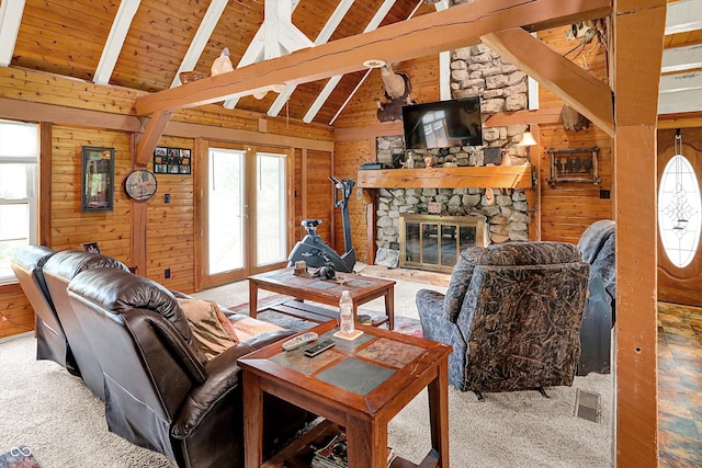 1155 Cope Rd, Martinsville, IN 46151 - living room with wood walls, carpet floors, a stone fireplace, a wood ceiling with exposed beams, and high vaulted ceiling