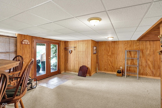 1155 Cope Rd, Martinsville, IN 46151 - tiled dining space with french doors, carpet floors, wooden walls, and a drop ceiling