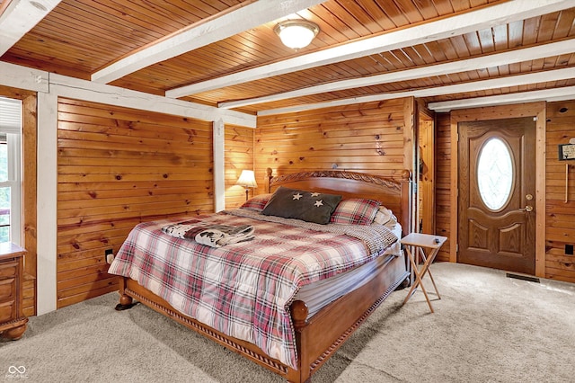 1155 Cope Rd, Martinsville, IN 46151 - carpeted bedroom with wooden walls and a wood ceiling with exposed beams