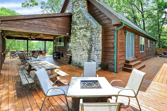 1155 Cope Rd, Martinsville, IN 46151 - wooden deck with outdoor dining area, entry steps, and a fire pit