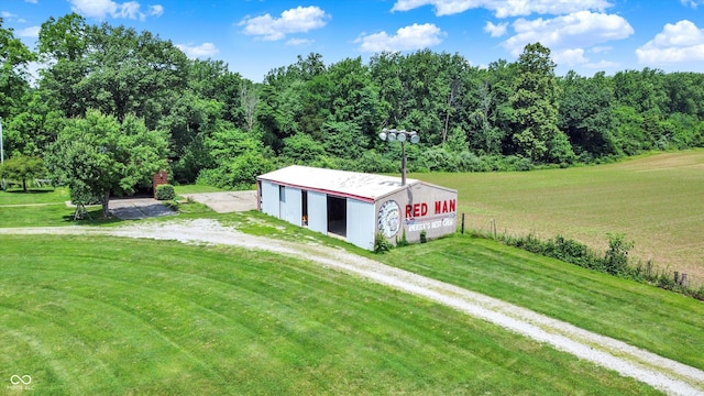 1155 Cope Rd, Martinsville, IN 46151 - view of front facade with a pole building, a front lawn, an outbuilding, and a detached garage