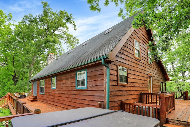 1155 Cope Rd, Martinsville, IN 46151 - view of home's exterior featuring a deck, a shingled roof, and a chimney