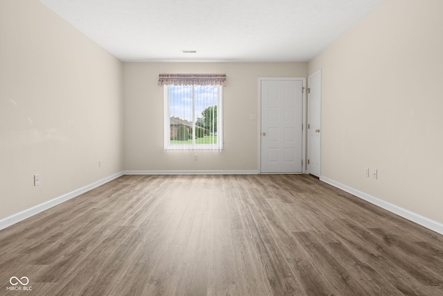 1309 Wyoming Way, Anderson, IN 46013 - empty room with wood finished floors and baseboards