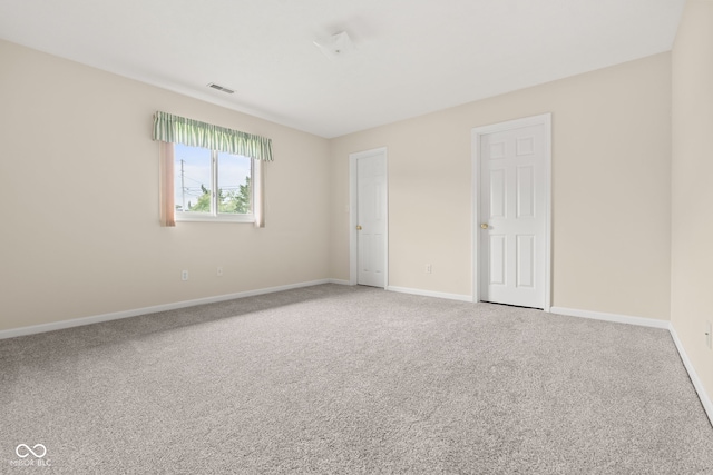 1309 Wyoming Way, Anderson, IN 46013 - unfurnished bedroom featuring carpet flooring and baseboards