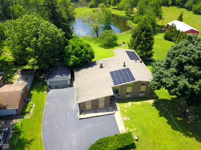 3265 Tulip Dr, Indianapolis, IN 46227 - aerial view of property and surrounding area with a nearby body of water and a tree filled landscape