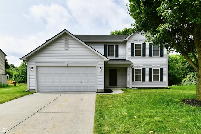 5759 Columbia Cir S, Greenwood, IN 46142 - traditional-style home featuring concrete driveway, a garage, a front lawn, and roof with shingles