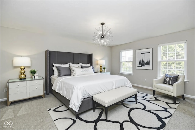 5759 Columbia Cir S, Greenwood, IN 46142 - bedroom with a chandelier and light carpet