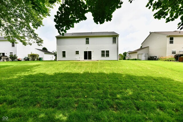 5759 Columbia Cir S, Greenwood, IN 46142 - rear view of house featuring a lawn