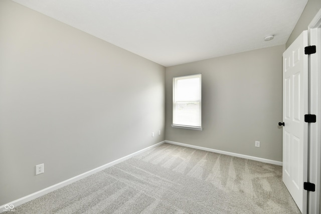 5759 Columbia Cir S, Greenwood, IN 46142 - empty room with light colored carpet and a smoke detector
