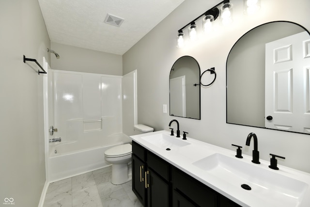 5759 Columbia Cir S, Greenwood, IN 46142 - bathroom with double vanity, marble finish floors, shower / washtub combination, and a textured ceiling