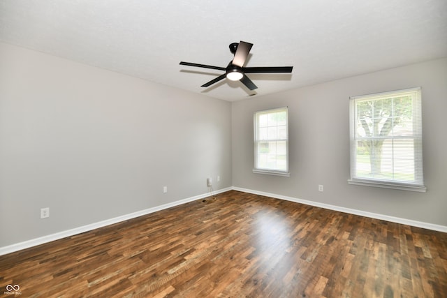 5759 Columbia Cir S, Greenwood, IN 46142 - spare room with dark wood finished floors and ceiling fan