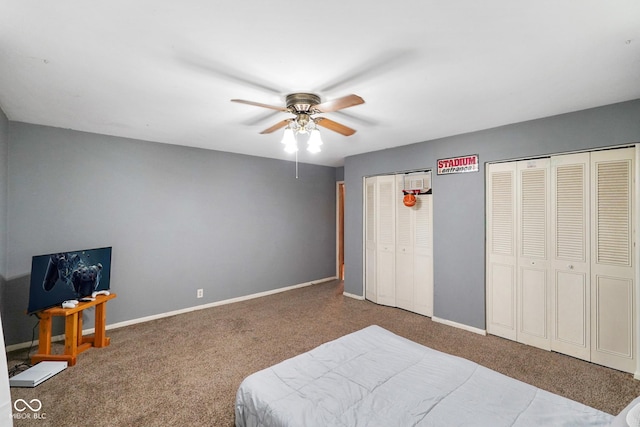 13041 S Finer St, Pimento, IN 47866 - bedroom featuring multiple closets, carpet floors, and ceiling fan