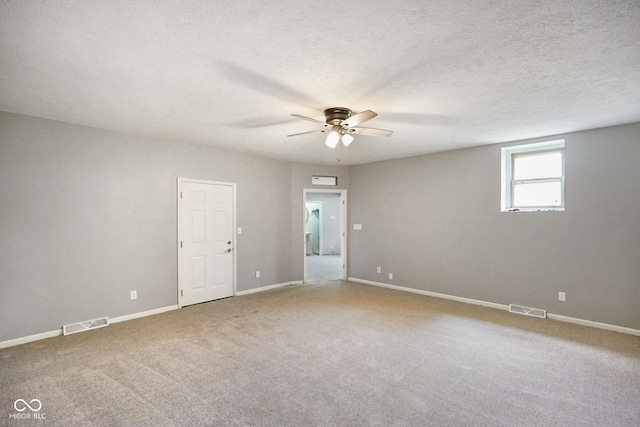 13041 S Finer St, Pimento, IN 47866 - unfurnished room with ceiling fan, carpet flooring, and a textured ceiling