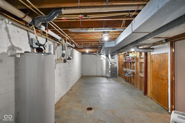 13041 S Finer St, Pimento, IN 47866 - unfinished below grade area with gas water heater and heating unit