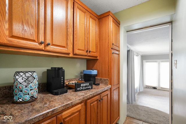13041 S Finer St, Pimento, IN 47866 - kitchen featuring brown cabinets and tile patterned flooring