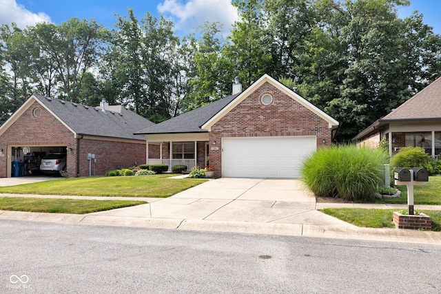 9735 Woodsong Ln, Indianapolis, IN 46229 - view of front of property featuring brick siding, a front lawn, an attached garage, driveway, and a chimney