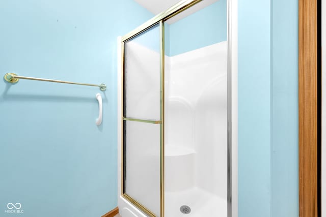 9735 Woodsong Ln, Indianapolis, IN 46229 - bathroom featuring a stall shower