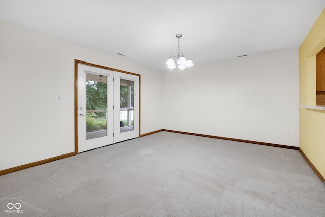 9735 Woodsong Ln, Indianapolis, IN 46229 - empty room with carpet flooring and a chandelier